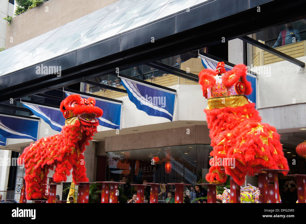 lion dance performance on stilts Stock Photo Alamy
