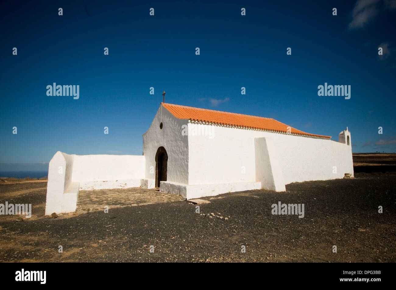 remote church churches rural lanzorote canary islands old canaries island white blue sky skies Stock Photo