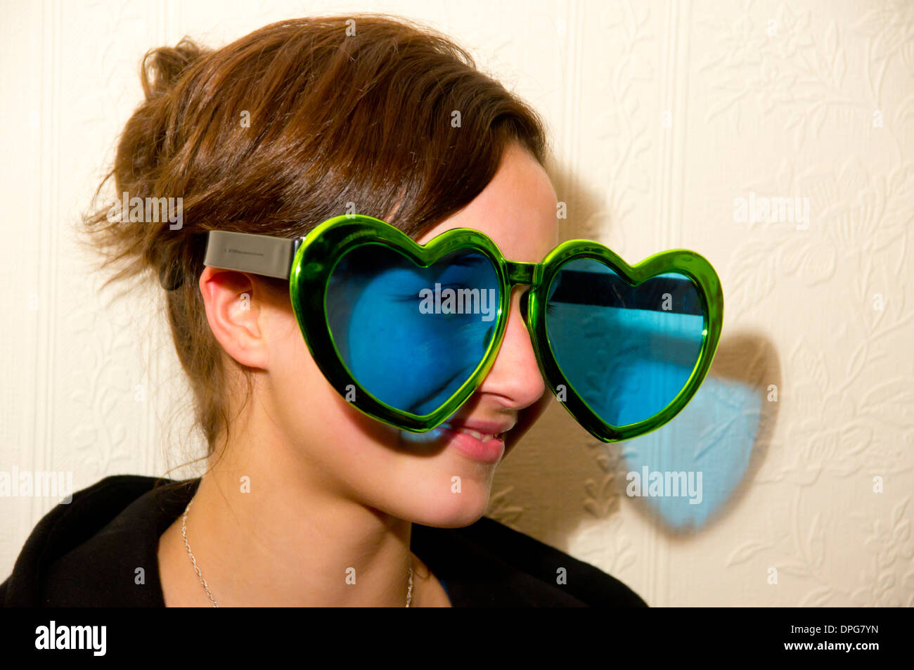 Blue coloured heart shaped spectacles Stock Photo