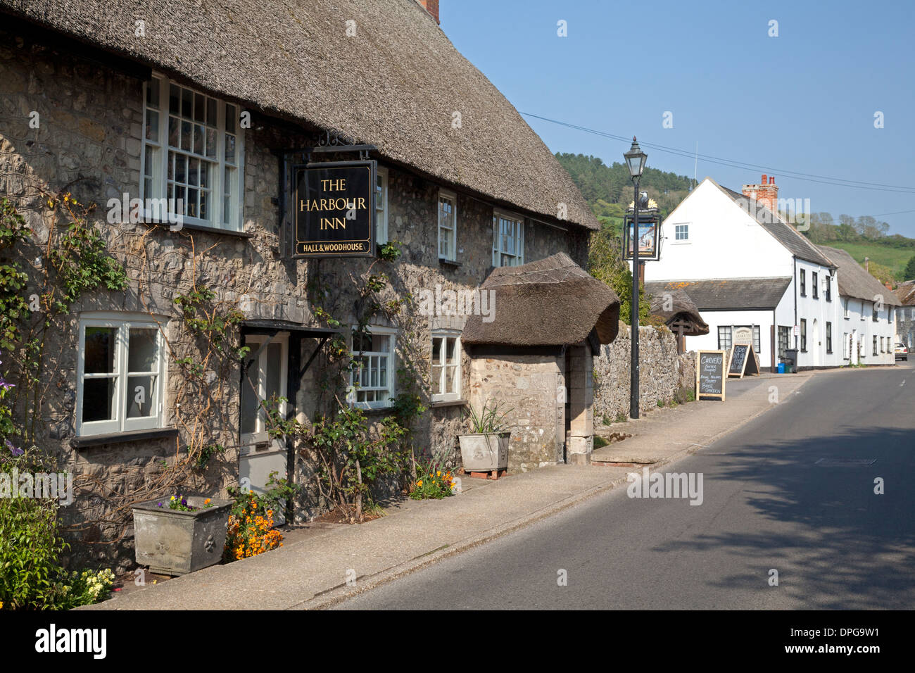 Village centre and Harbour Inn, Axmouth, Devon Stock Photo