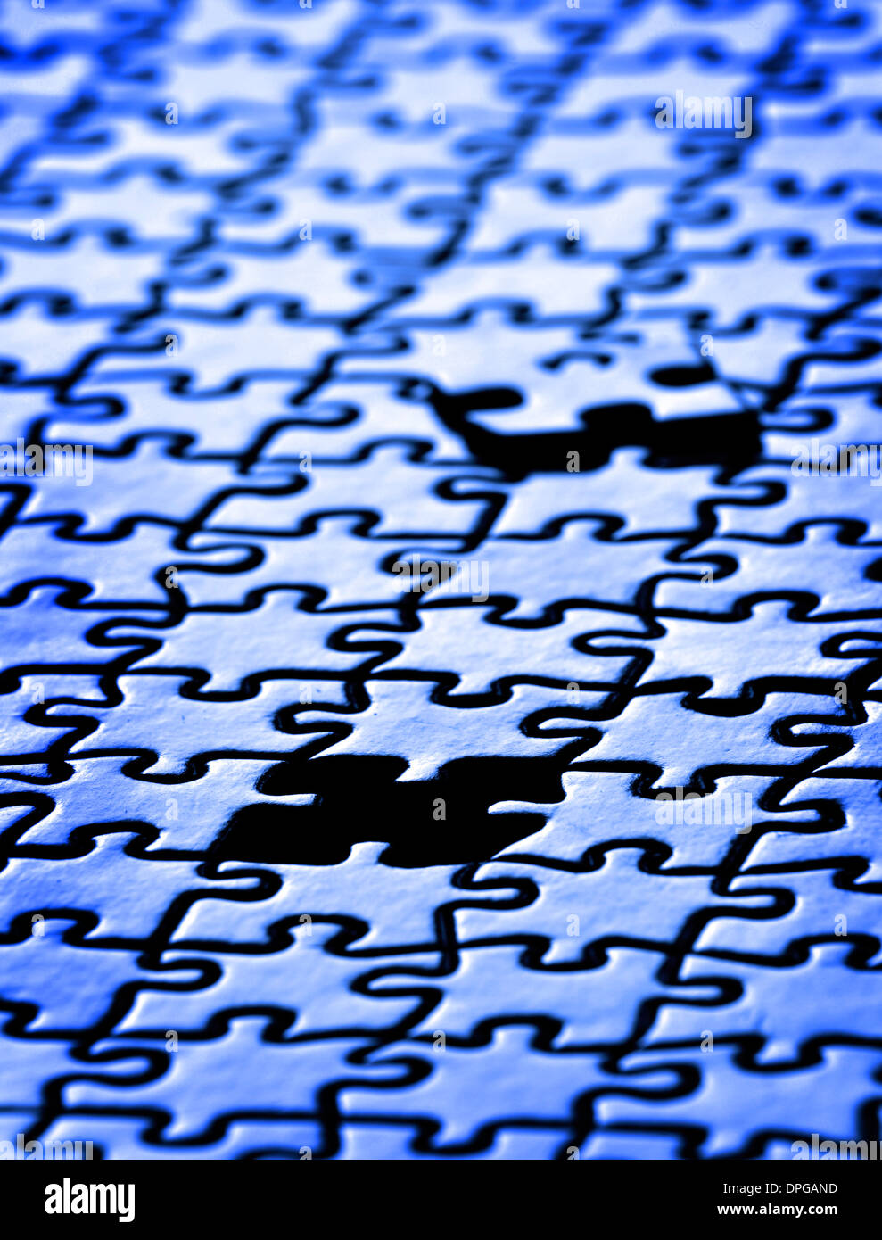 Several puzzle pieces put together symbolizing success and completion of a project Stock Photo