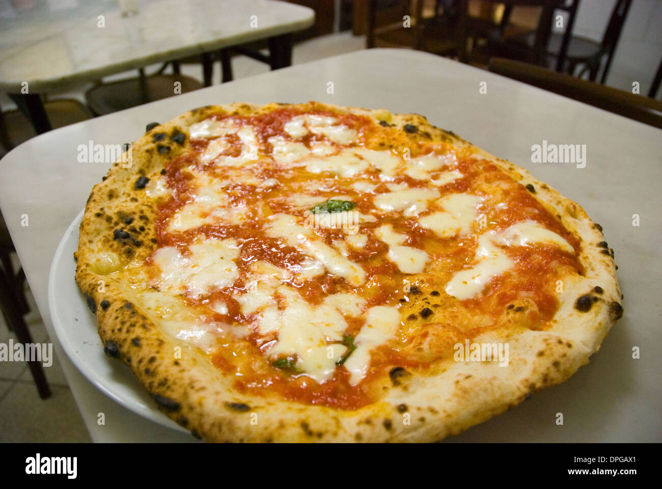 Pizza margherita in l'antica pizzeria Da Michele in Centro Storico district of Naples Italy Europe Stock Photo