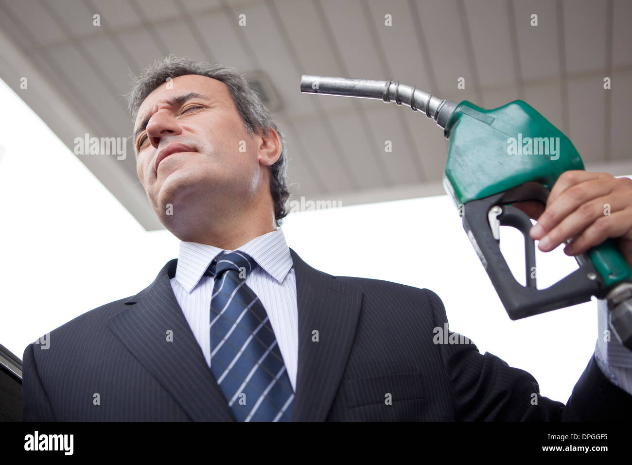 Consumers with few alternatives express frustration as gas prices soar and oil industry profits grow Stock Photo