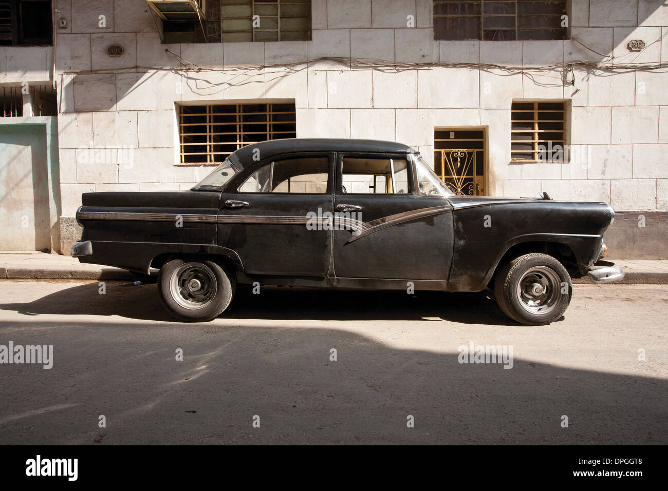Vintage car parked on street Stock Photo Alamy