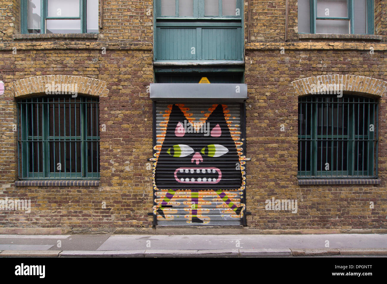 famous Graffiti art in the London district of Shoreditch, London