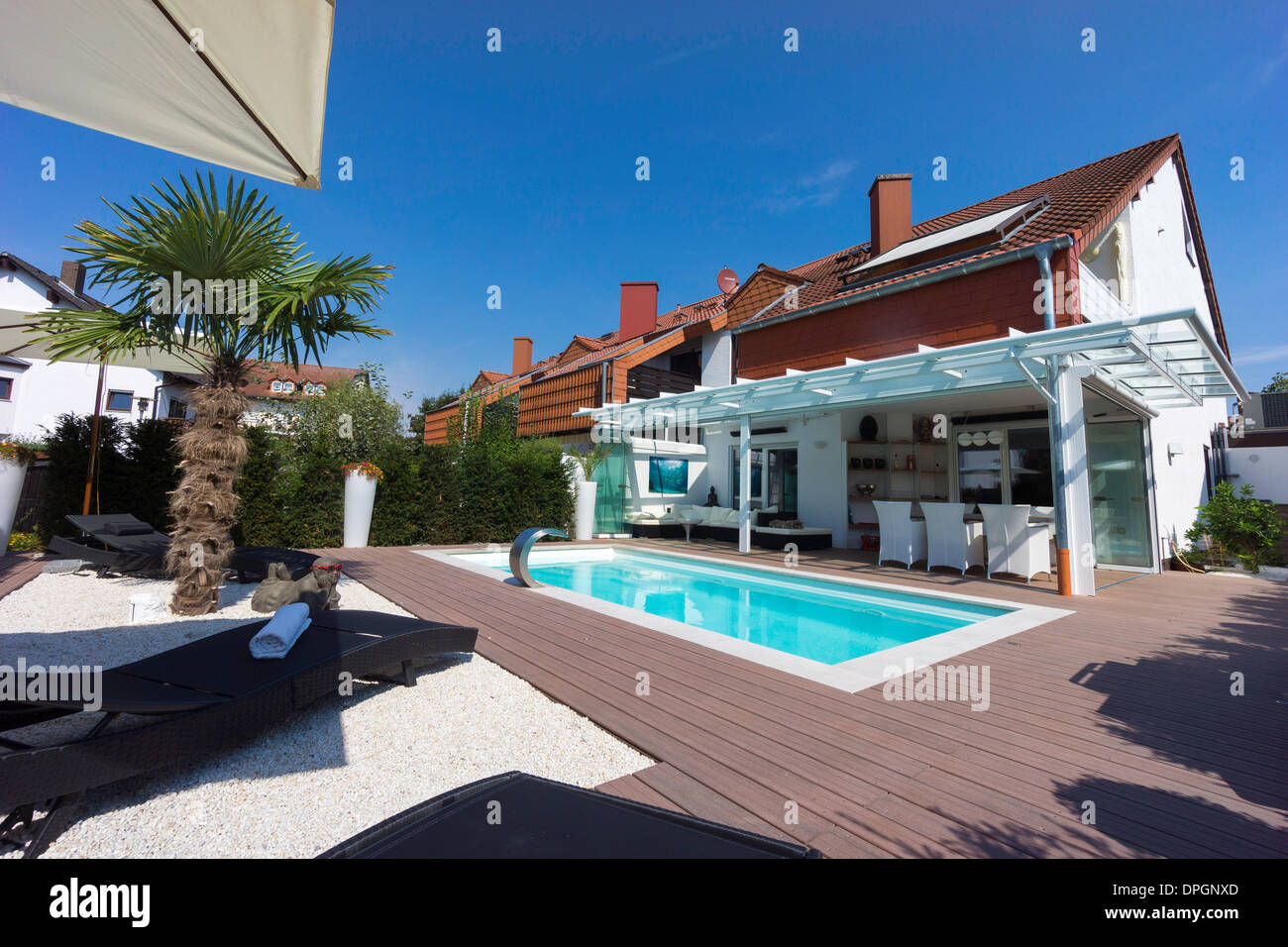 Private terraced house with garden, winter garden, pool and terrace, Germany, Europe - August 2013 Stock Photo