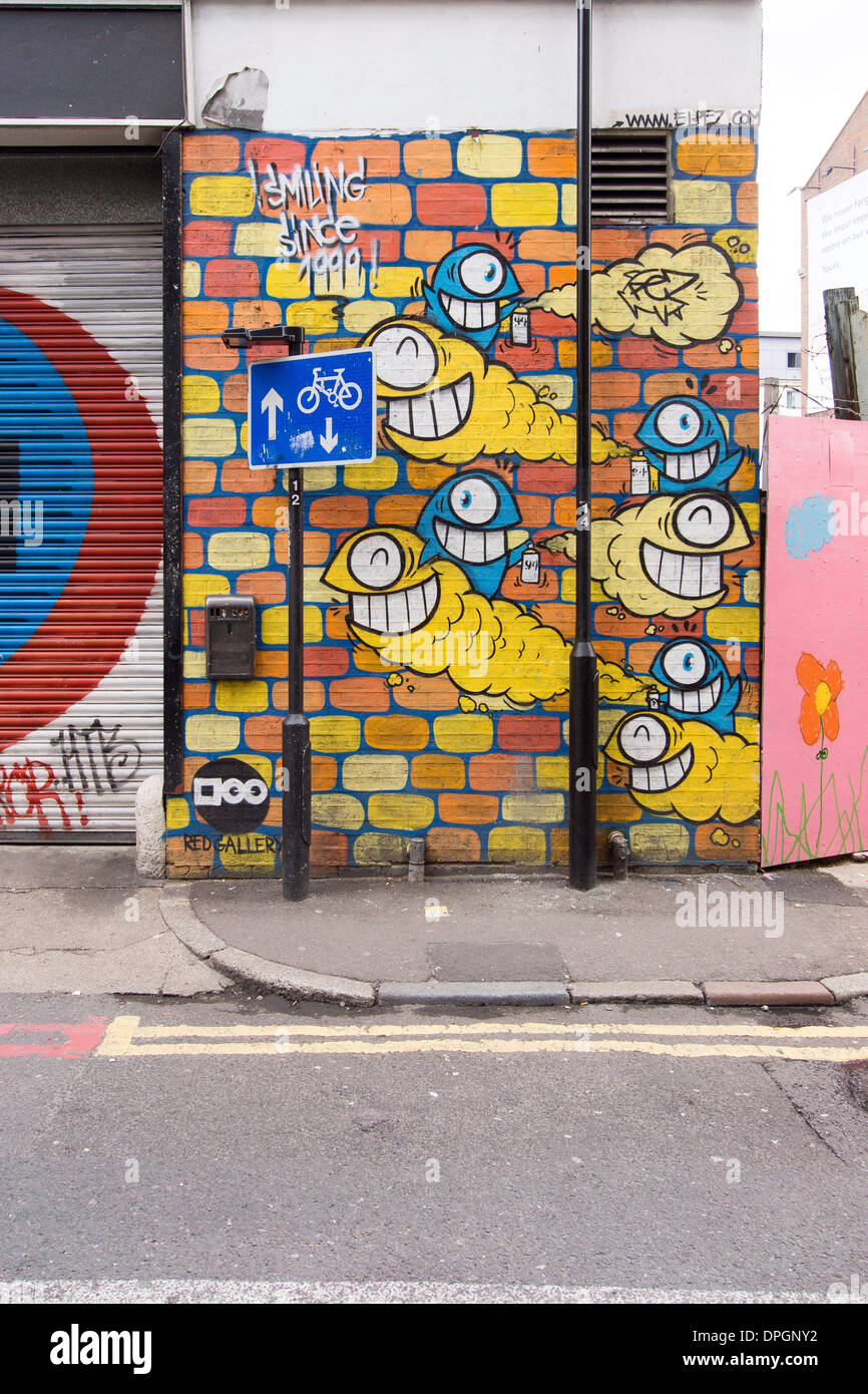 famous Graffiti art in the London district of Shoreditch, London