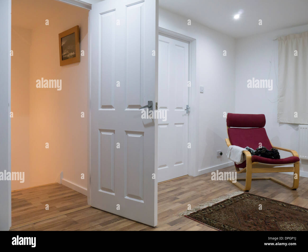 Loft room with red chair Stock Photo