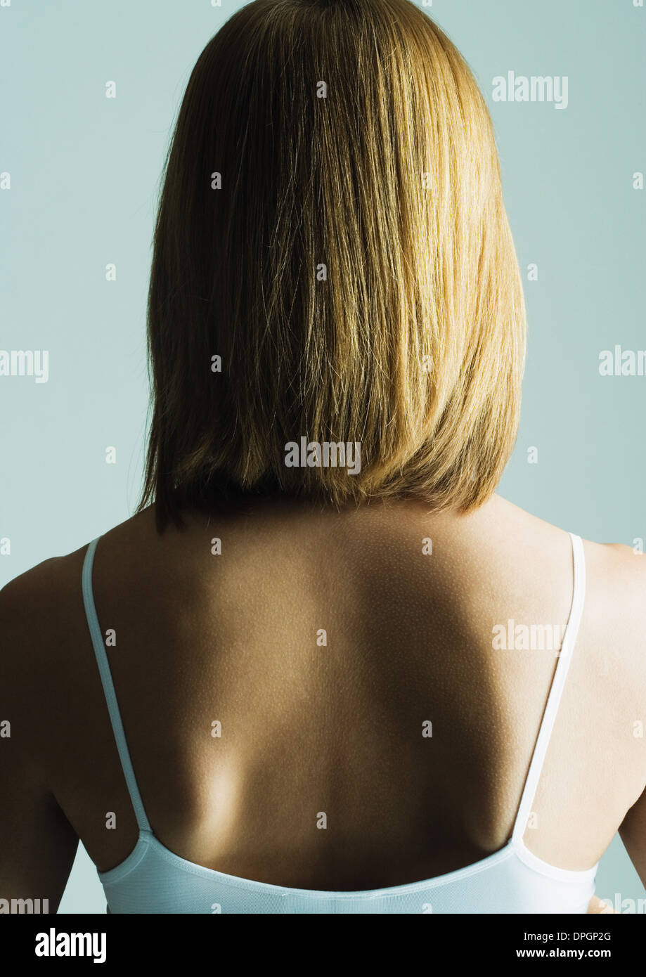 Young woman with shoulder length hair, rear view Stock Photo - Alamy