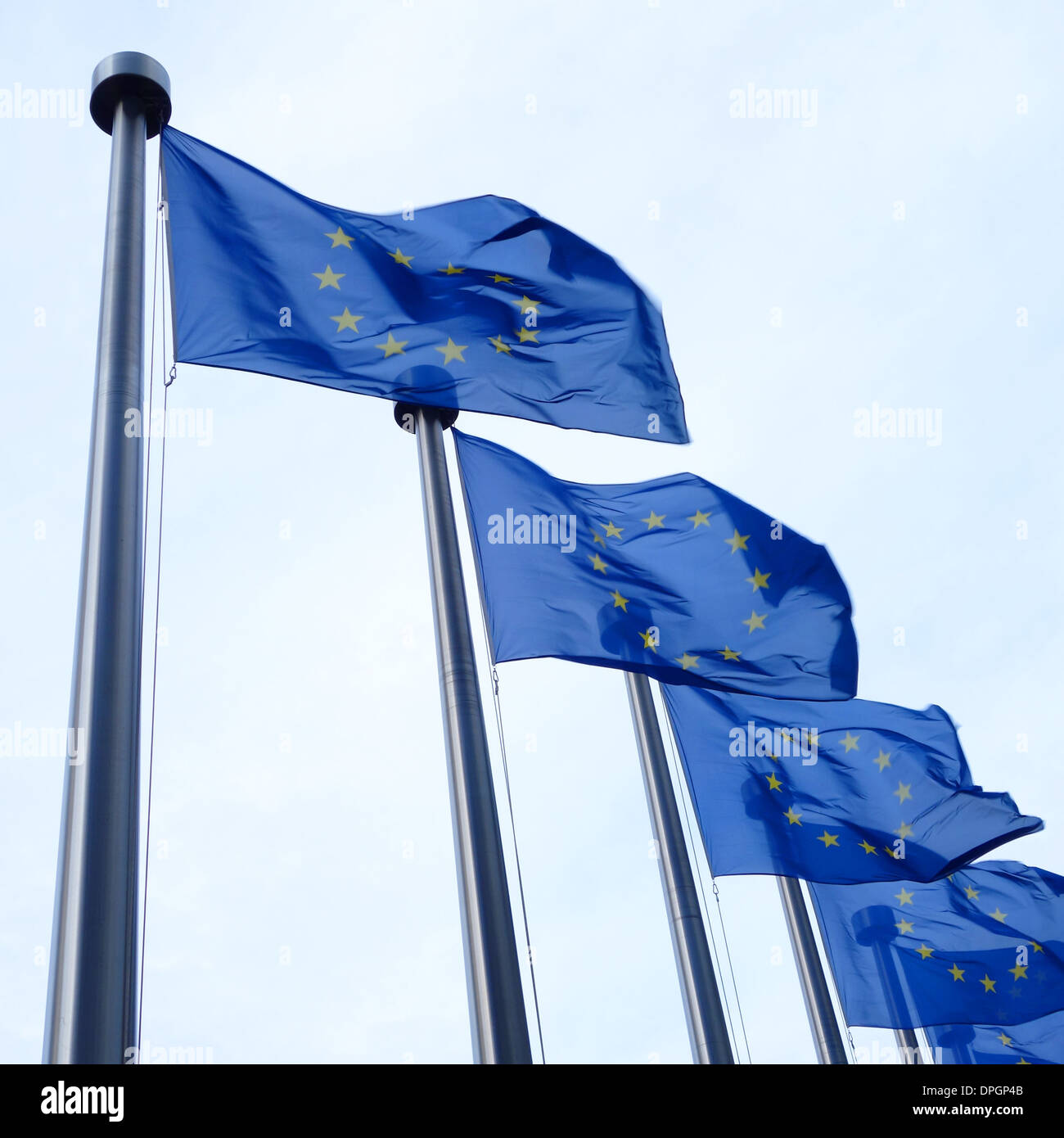 EU flags flying, in front of the European Commission buildings in Brussels, Belgium. Stock Photo