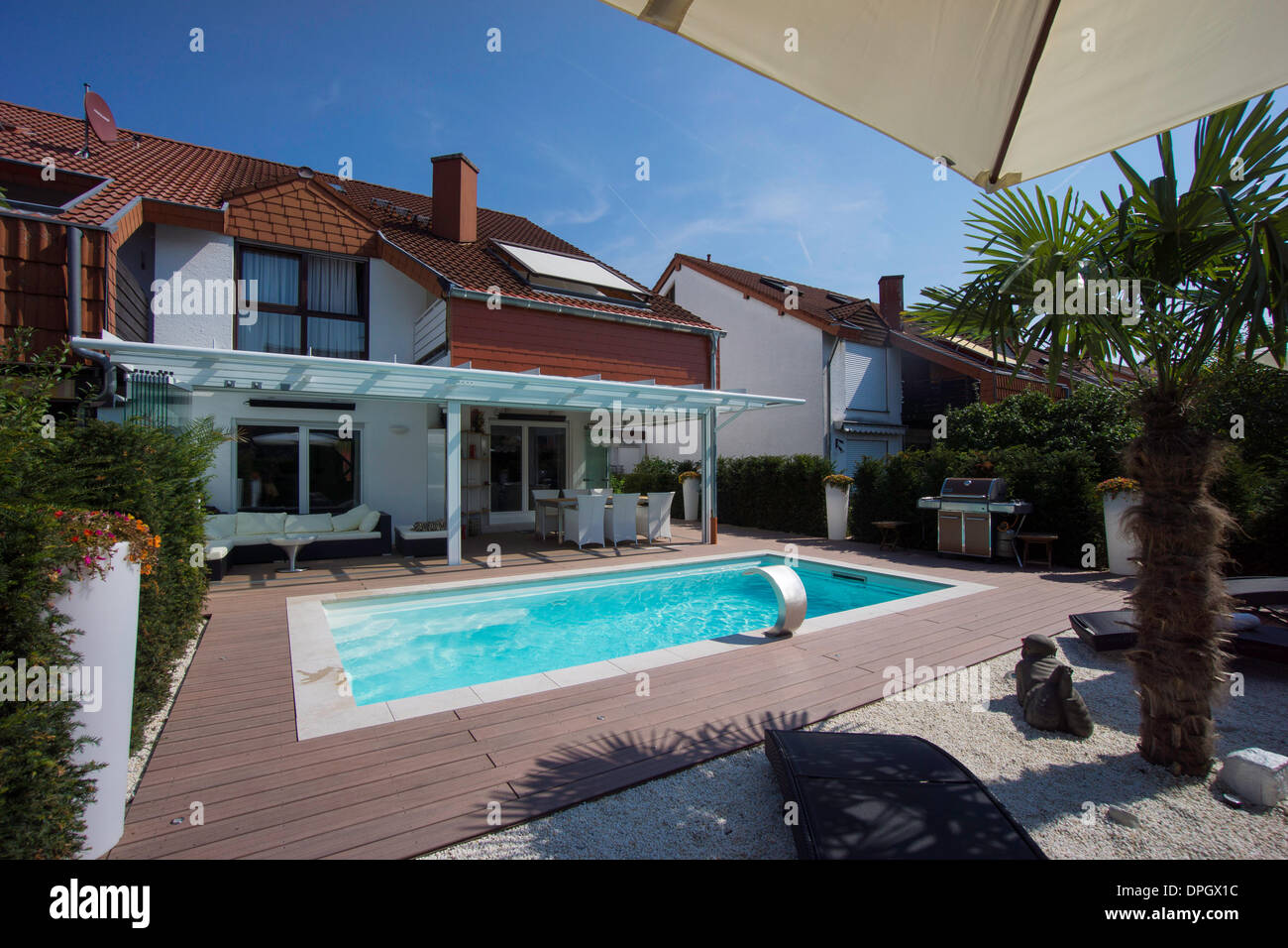 Private terraced house with garden, winter garden, pool and terrace, Germany, Europe - August 2013 Stock Photo