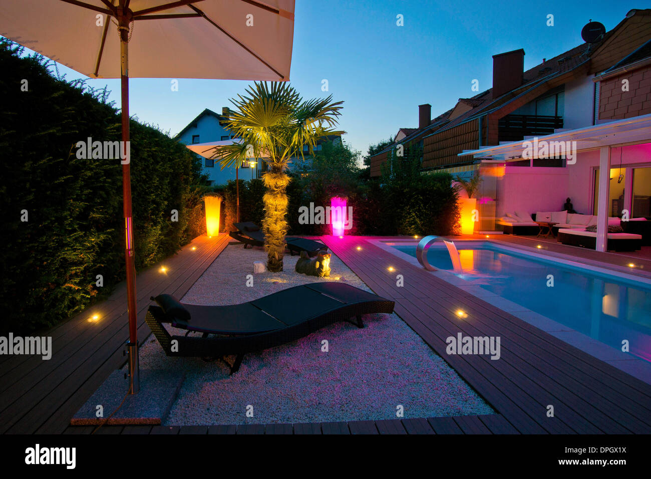Private house with terrace, sun loungers and pool, Germany, Europe - August 2013 Stock Photo