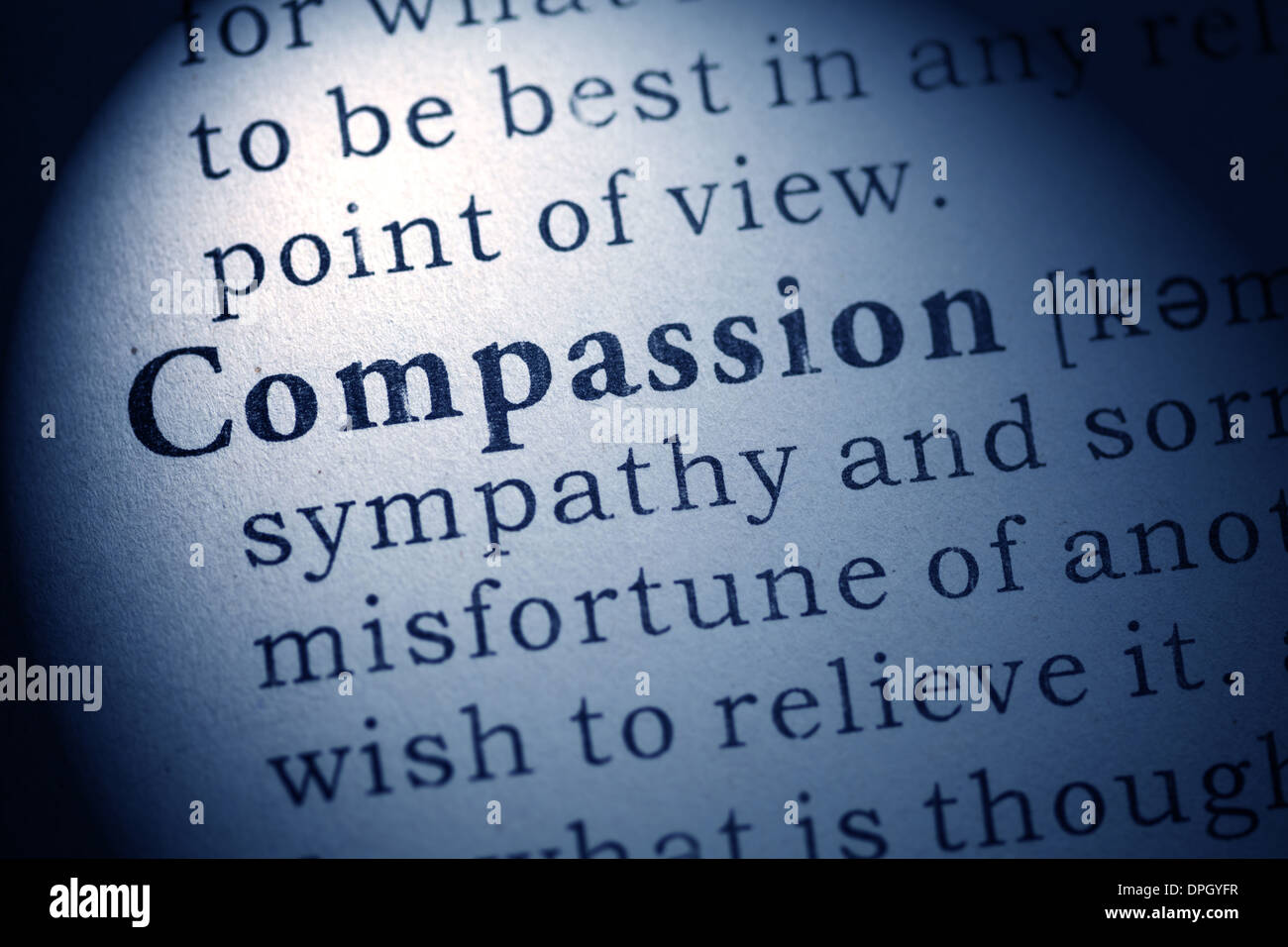 Fake Dictionary, Dictionary definition of compassion. Stock Photo