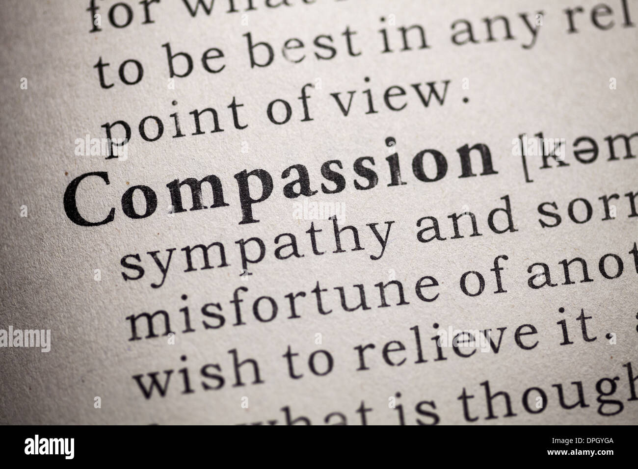 Fake Dictionary, Dictionary definition of compassion. Stock Photo