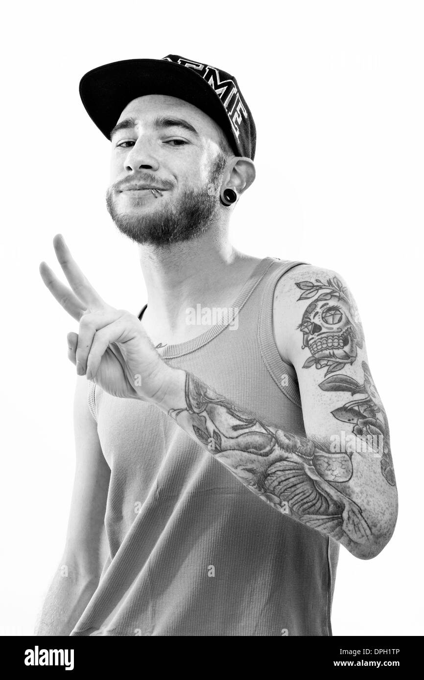 Young tattooed man Stock Photo - Alamy