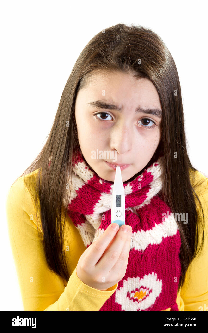 ill girl child worried with thermometer Stock Photo