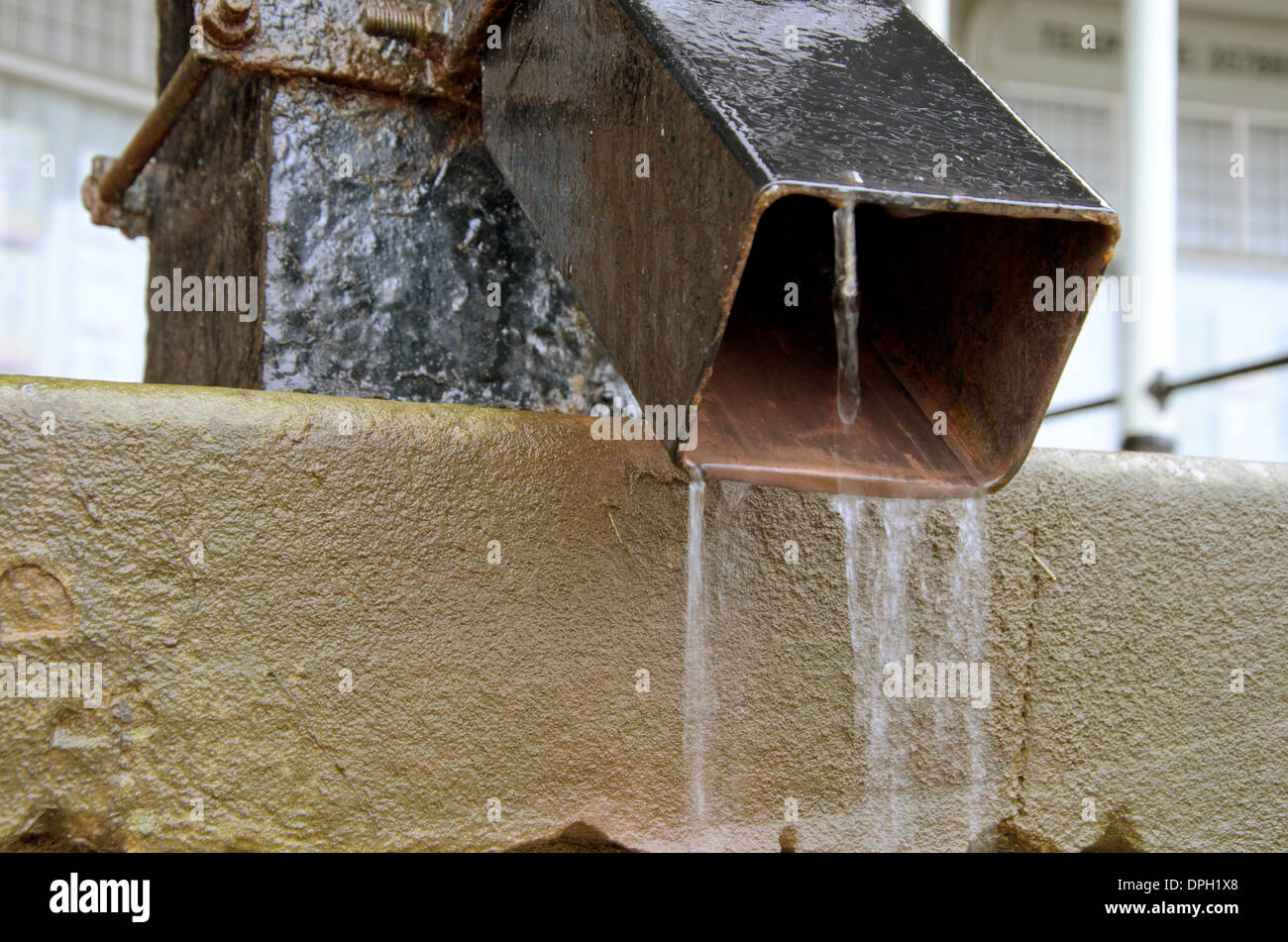 Close up detail of square metal drain pipe during heavy rainfall Stock  Photo - Alamy