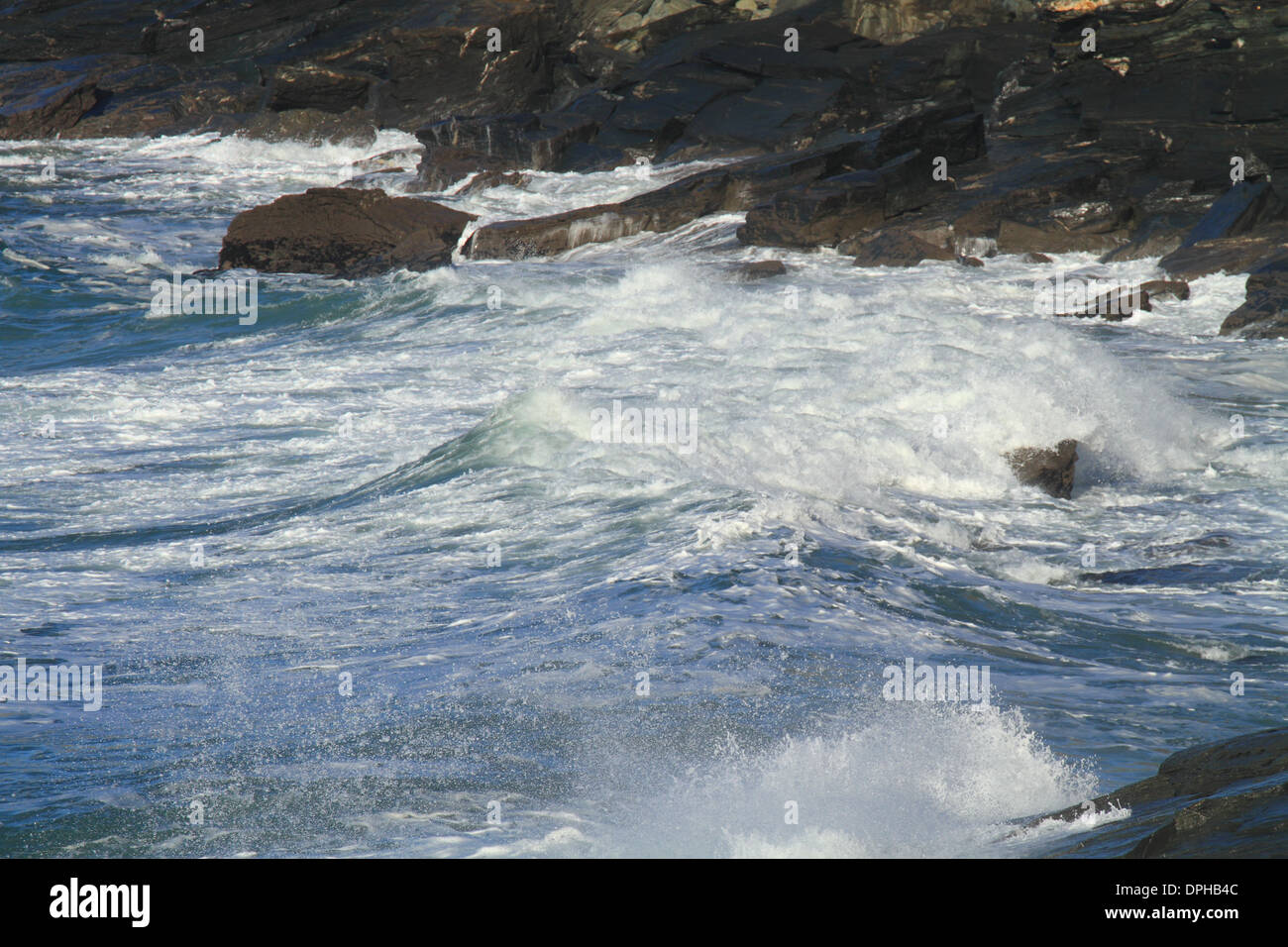 Breaking waves on rocky North Cornwall Coast, England, UK Stock Photo ...
