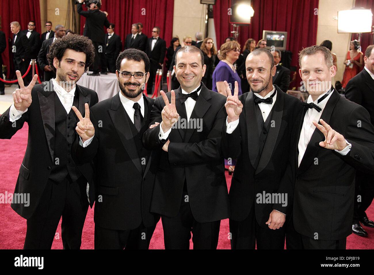 Mar. 28, 2006 - Kodak Theatre, HOLLYWOOD LOS ANGELES, USA - KAIS NASHEF, AMER HLEHEL, HANY ABU-ASSAD, ALI SULIMAN & BERO BEYER.DIRECTOR, PRODUCER & ACTORS.78TH ACADEMY AWARDS.KODAK THEATRE, HOLLYWOOD LOS ANGELES, USA.05-Mar-06.LAQ65818.K47133.03-05-2006.(Credit Image: © Globe Photos/ZUMAPRESS.com) Stock Photo