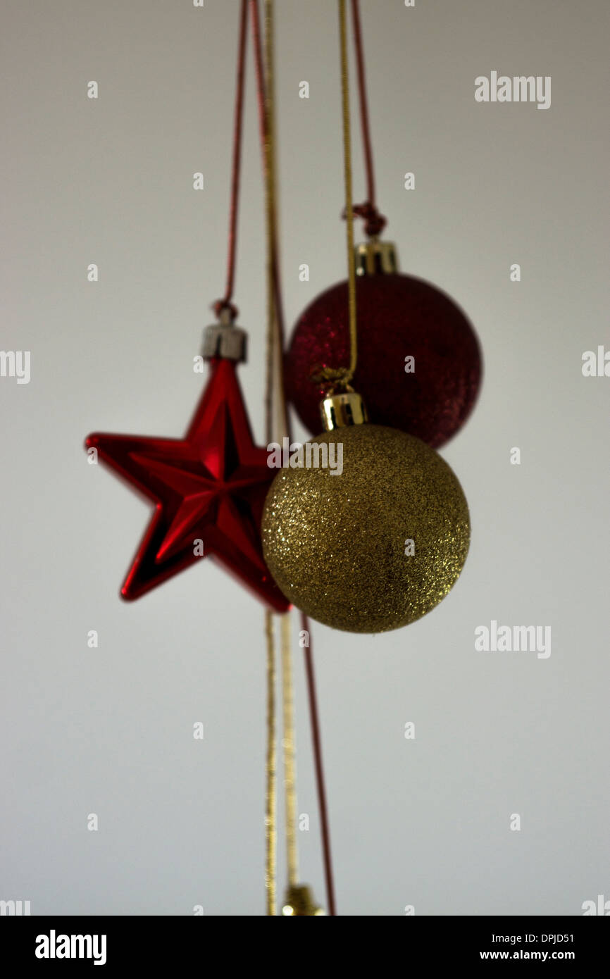 hanging string decorations sliver gold red white Stock Photo Alamy