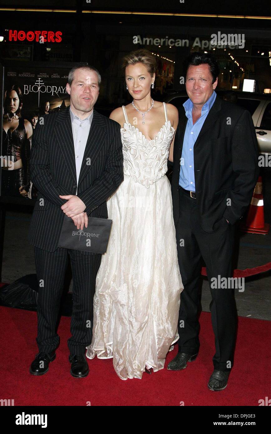 Feb. 21, 2006 - Hollywood, LOS ANGELES, USA - UWE BOLL, KRISTANNA LOKEN, MICHAEL MADSEN.FILM DIRECTOR & ACTORS.BLOODRAYNE, PREMIERE.CHINESE THEATRE, HOLLYWOOD, LOS ANGELES, USA.01-04-2006.LAP62533.K46899.CREDIT BY (Credit Image: © Globe Photos/ZUMAPRESS.com) Stock Photo