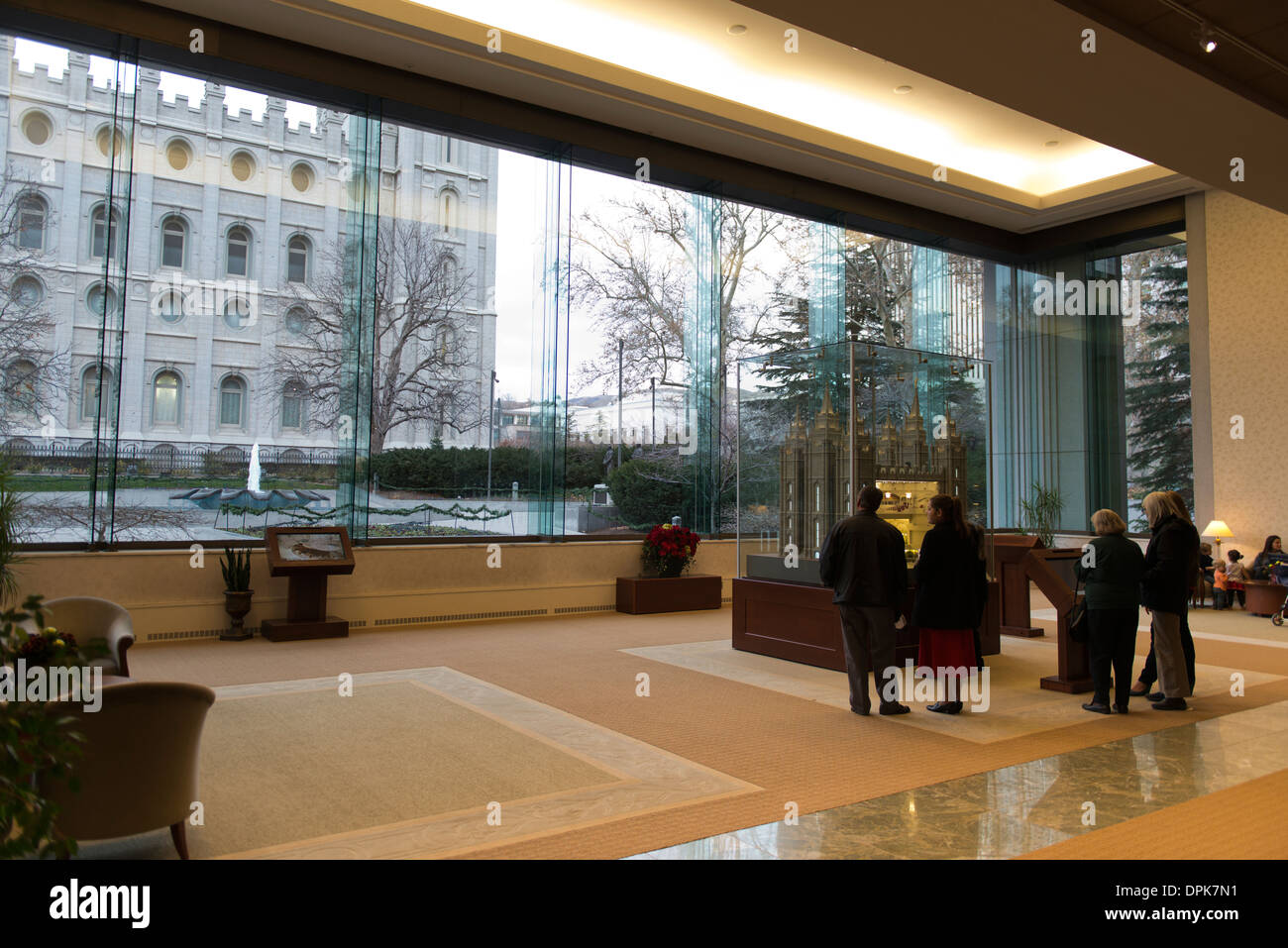 Interior of the South Visitors Center in Temple Square with the Salt Lake Temple visible through the window. Stock Photo