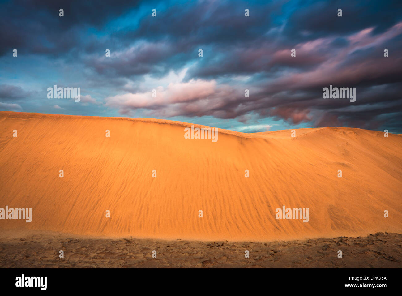 Sand dune at Maspalomas, Gran Canaria, Canary Islands, Spain, at sunset Stock Photo