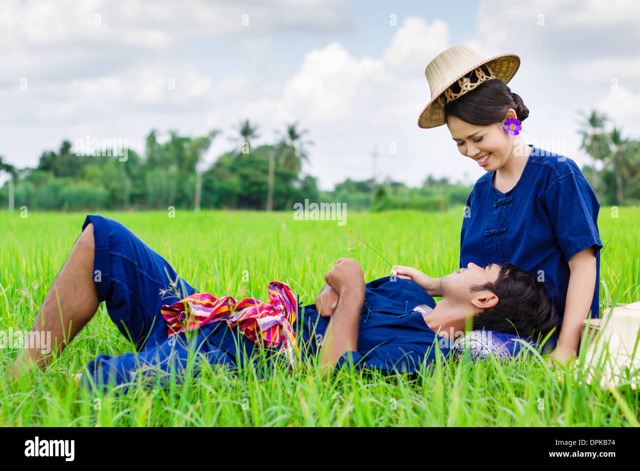 Couple farmer in farmer suit on rice fields  Stock Photo