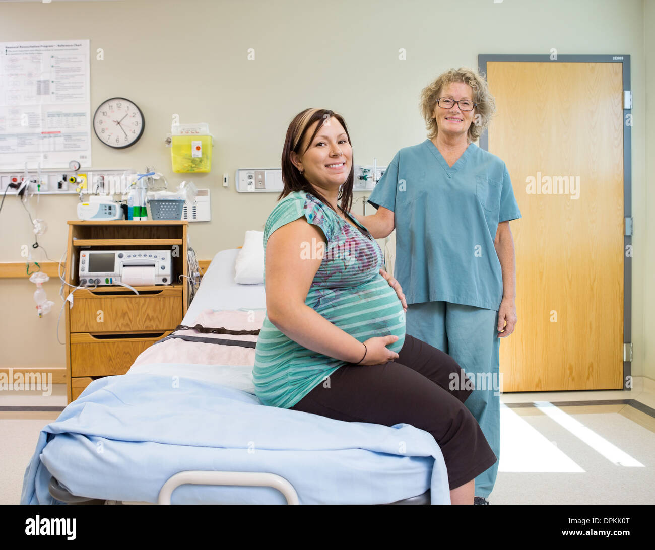 Woman giving birth happy hi-res stock photography and images - Alamy