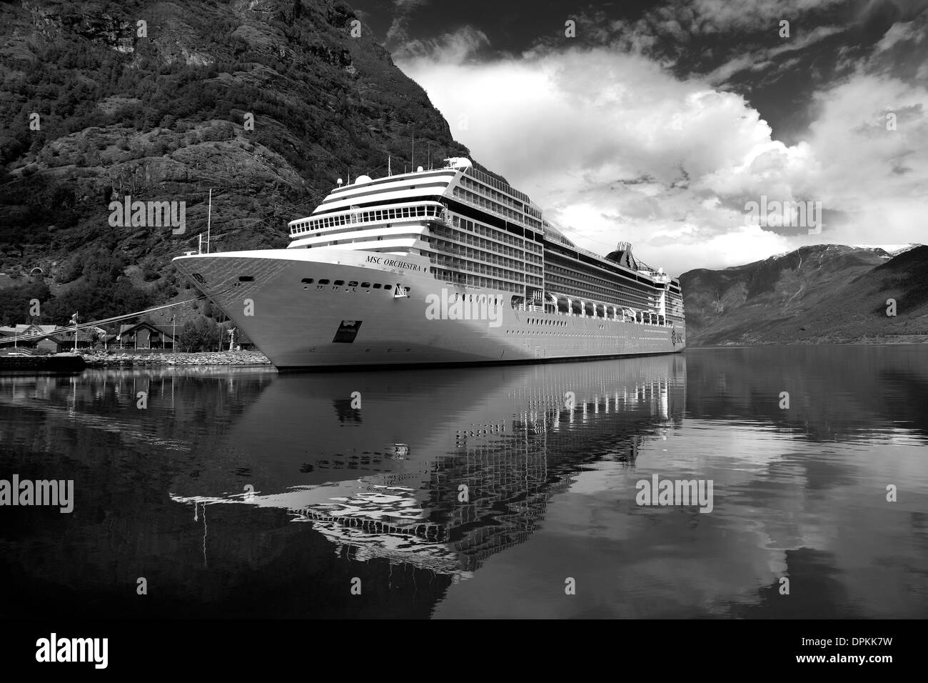 Cruise ship MSC Orchestra, harbour at the town of Flam, Aurlandsfjorden Fjord, Norway, Scandinavia, Europe. Stock Photo