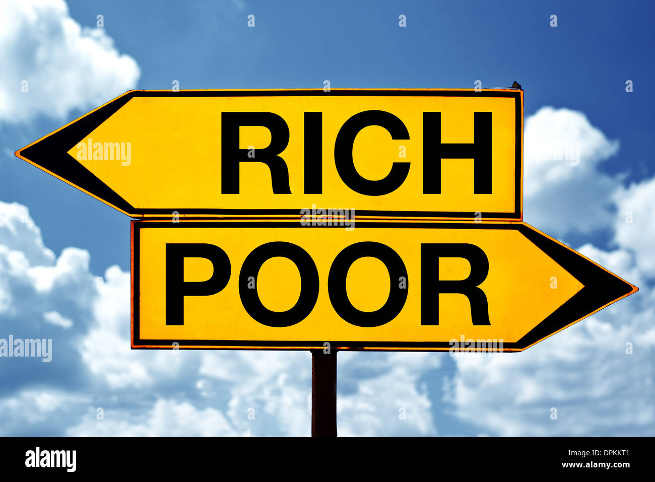 rich or poor, opposite signs. Two opposite signs against blue sky background. Stock Photo