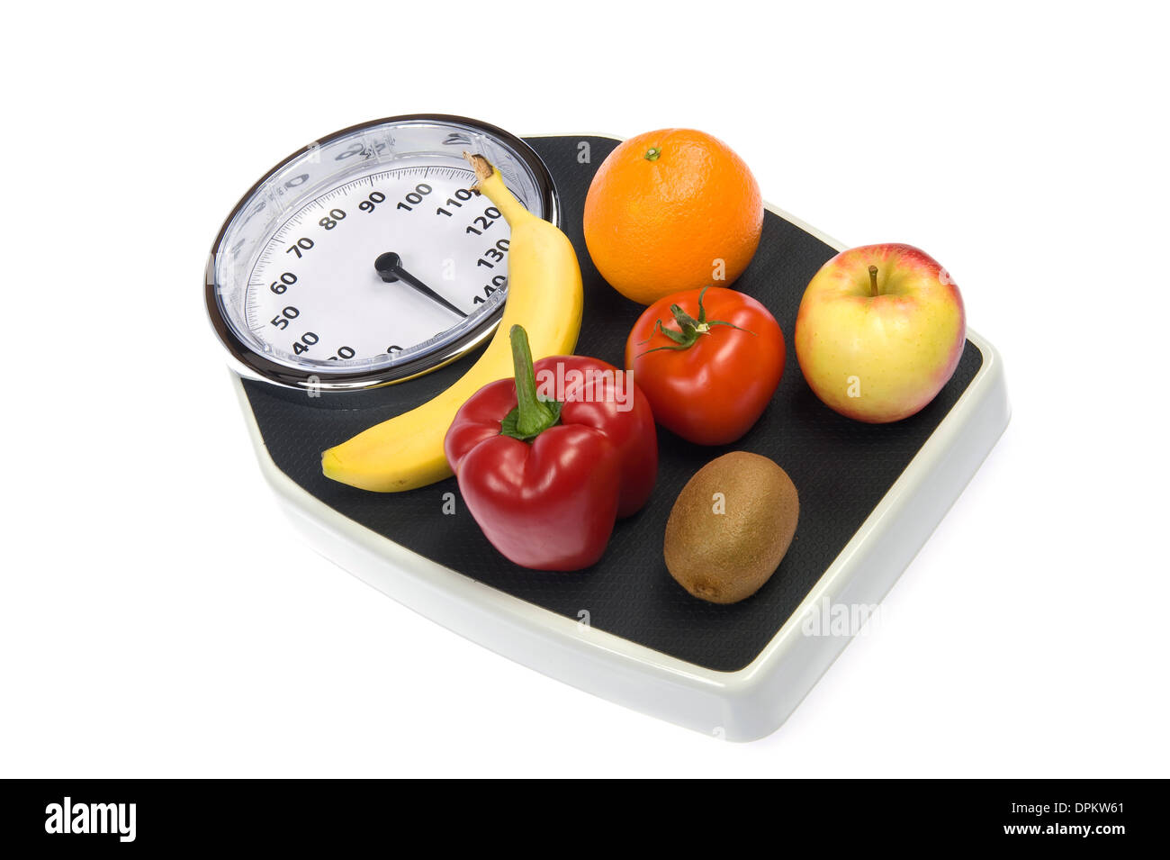 A weight scale with fruit Stock Photo