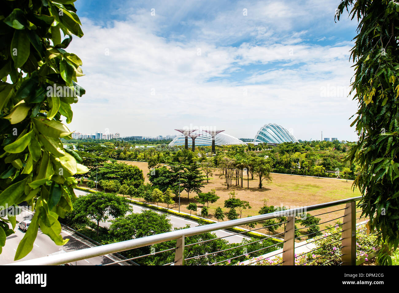 anoramic view of the Gardens by the bay in Singapore. Solar trees in the supertree grove can be seen in the distance. Stock Photo