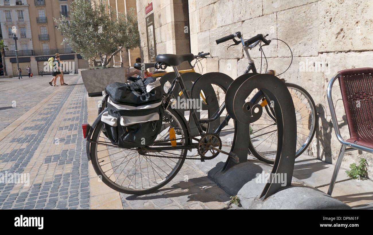 Bicycles parked outside the OldTown Hall, Narbonne, France. Stock Photo