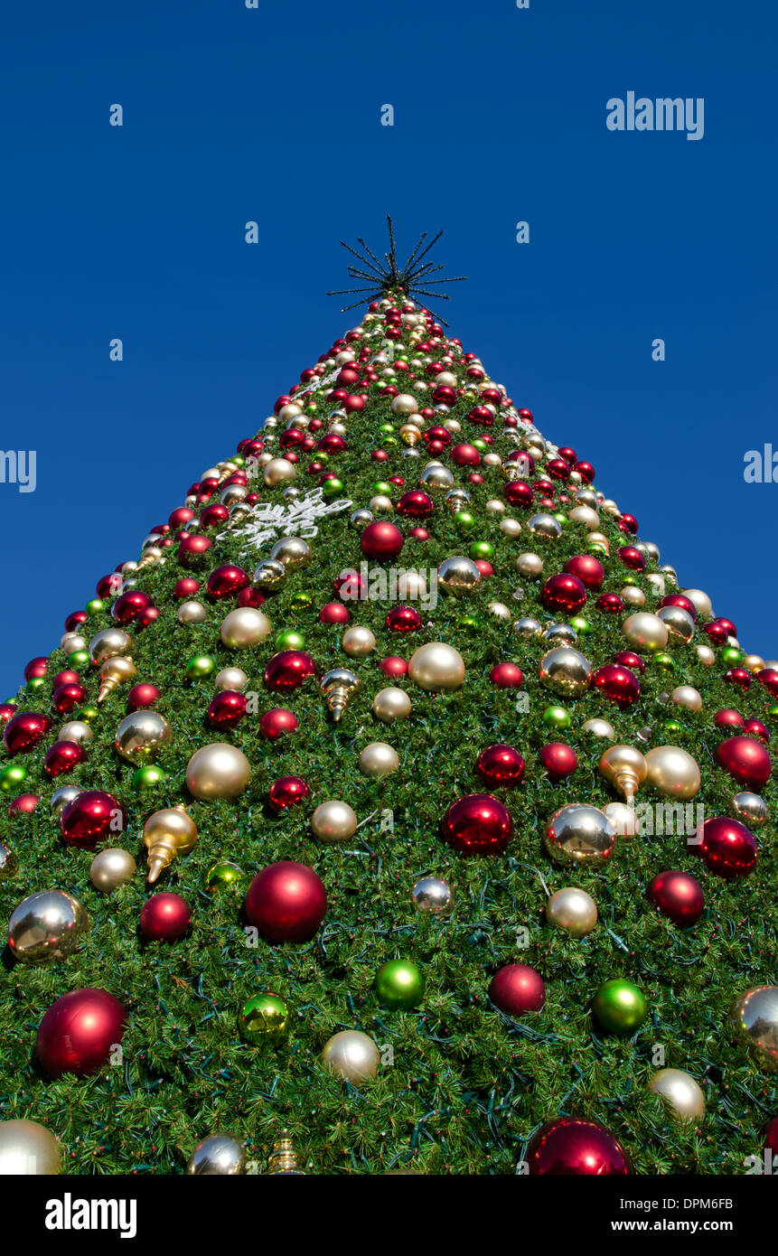 Giant Christmas tree against the sky Stock Photo