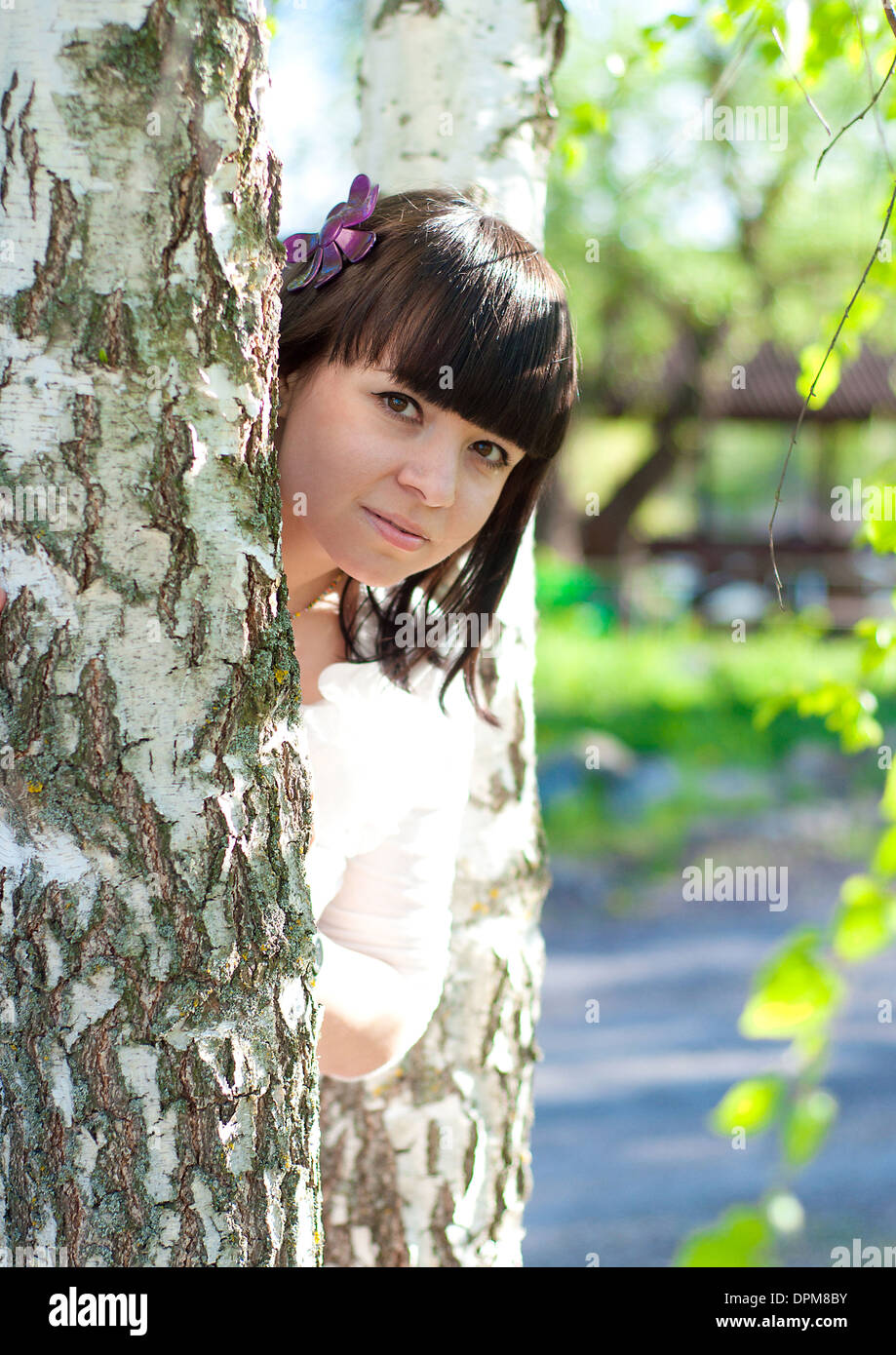 young beautiful girl on a walk in early spring Stock Photo - Alamy