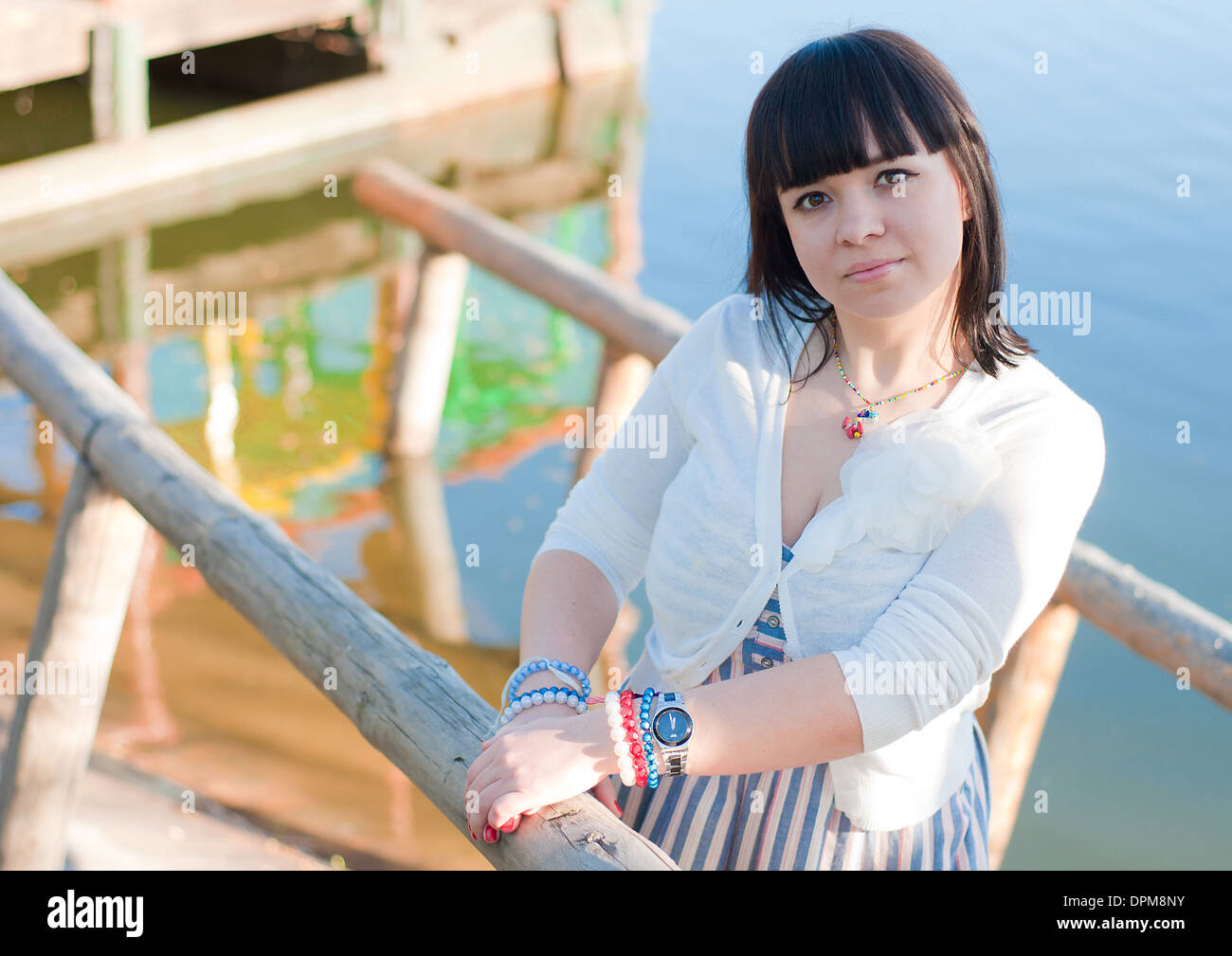 young beautiful girl on a walk in early spring Stock Photo