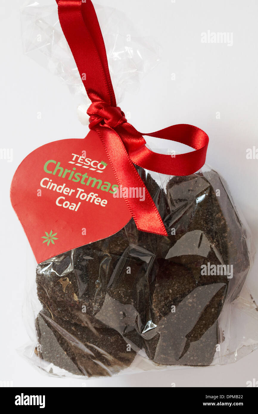 bag of Tesco Christmas Cinder toffee coal set on white background Stock Photo