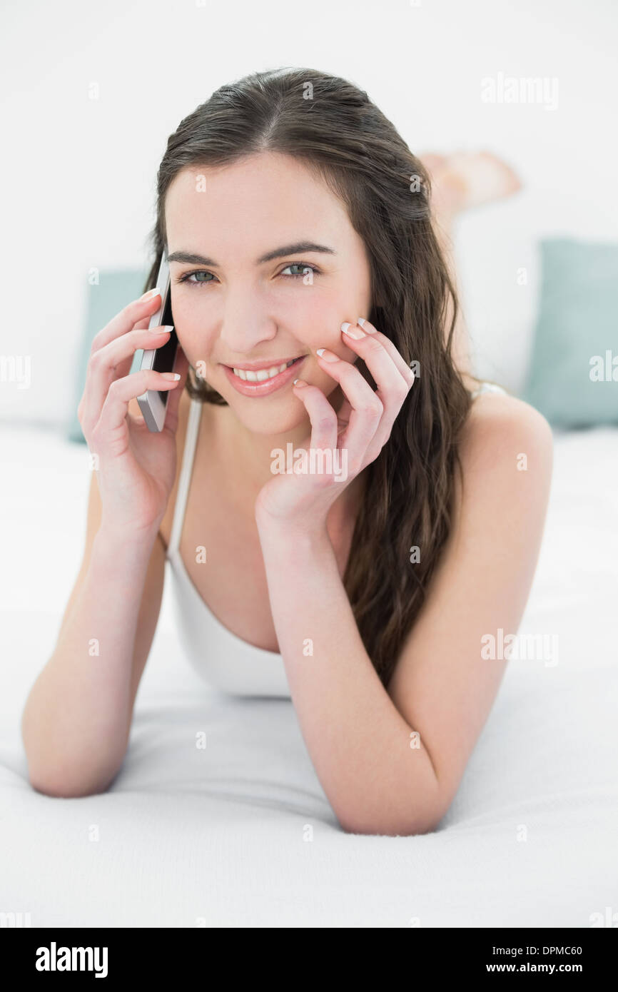 Relaxed young woman in white hi-res stock photography and images - Alamy