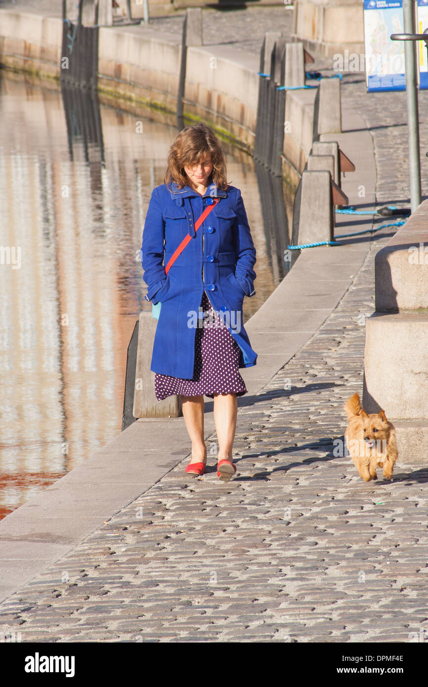 Young woman walking dog along Frederiksholms Canal, Copenhagen, Denmark  Stock Photo - Alamy