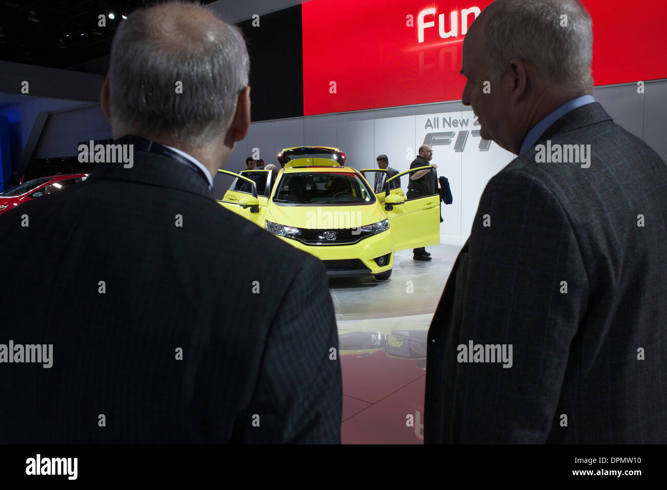 Detroit, Michigan - Journalists check out the 2015 Honda FIT on display at the North American International Auto Show. Stock Photo