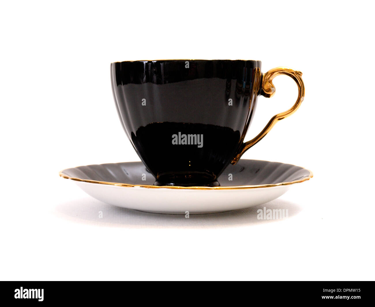 Black china tea cup on a white background Stock Photo Alamy