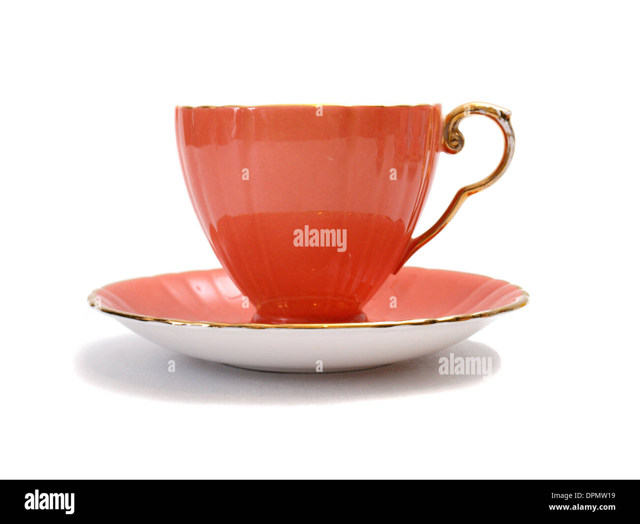 Red china tea cup on a white background. Stock Photo