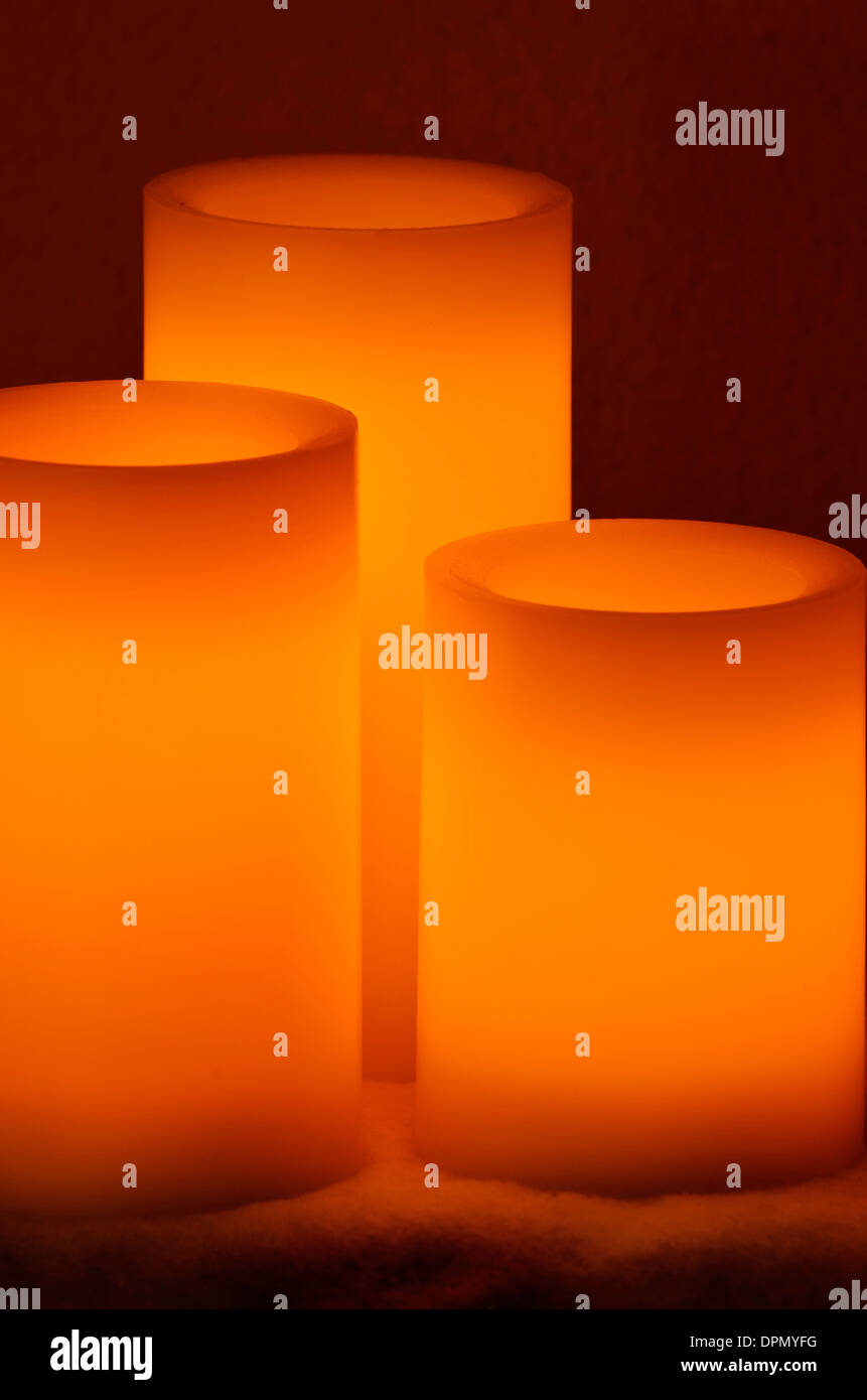 Group of candles burning bright in the dark night Stock Photo Alamy