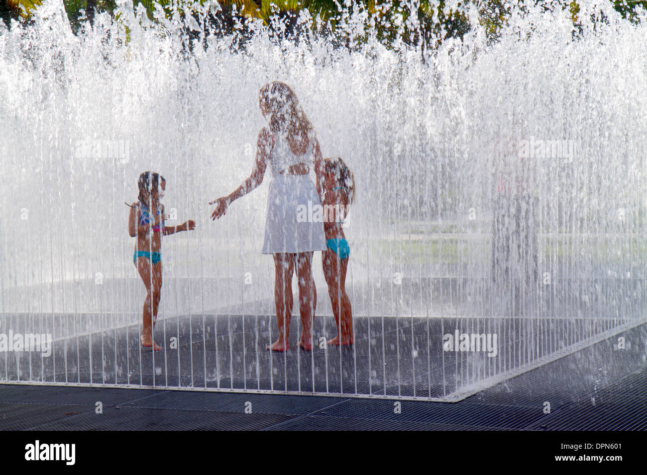 Miami Beach Florida,Art Basel,Art Public,Collins Park,fountain,water,adult  adults woman women female lady,mother mom,girl girls,youngster youngsters y  Stock Photo - Alamy