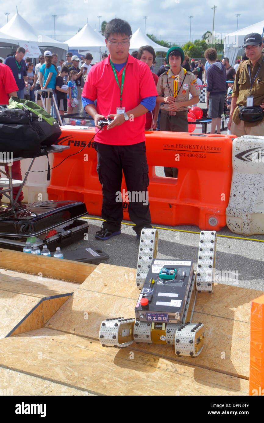 Miami Florida,Homestead,Speedway,DARPA Robotics Challenge Trials,exhibit exhibition collection student students Asian man men male,operating,remote co Stock Photo