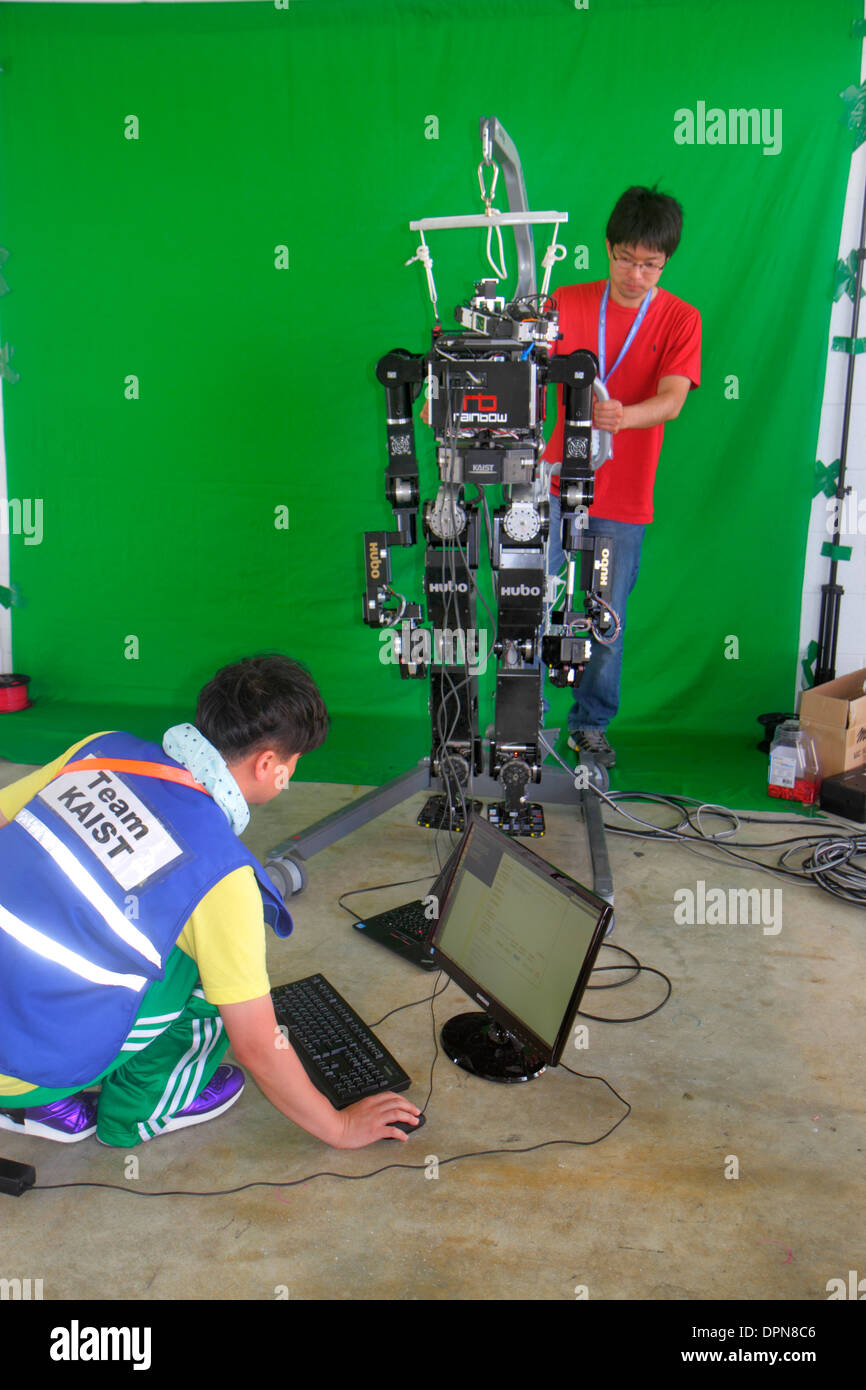 Miami Florida,Homestead,Speedway,DARPA Robotics Challenge Trials,remote controlled,robot,robots,man men male,student students engineering,man men male Stock Photo