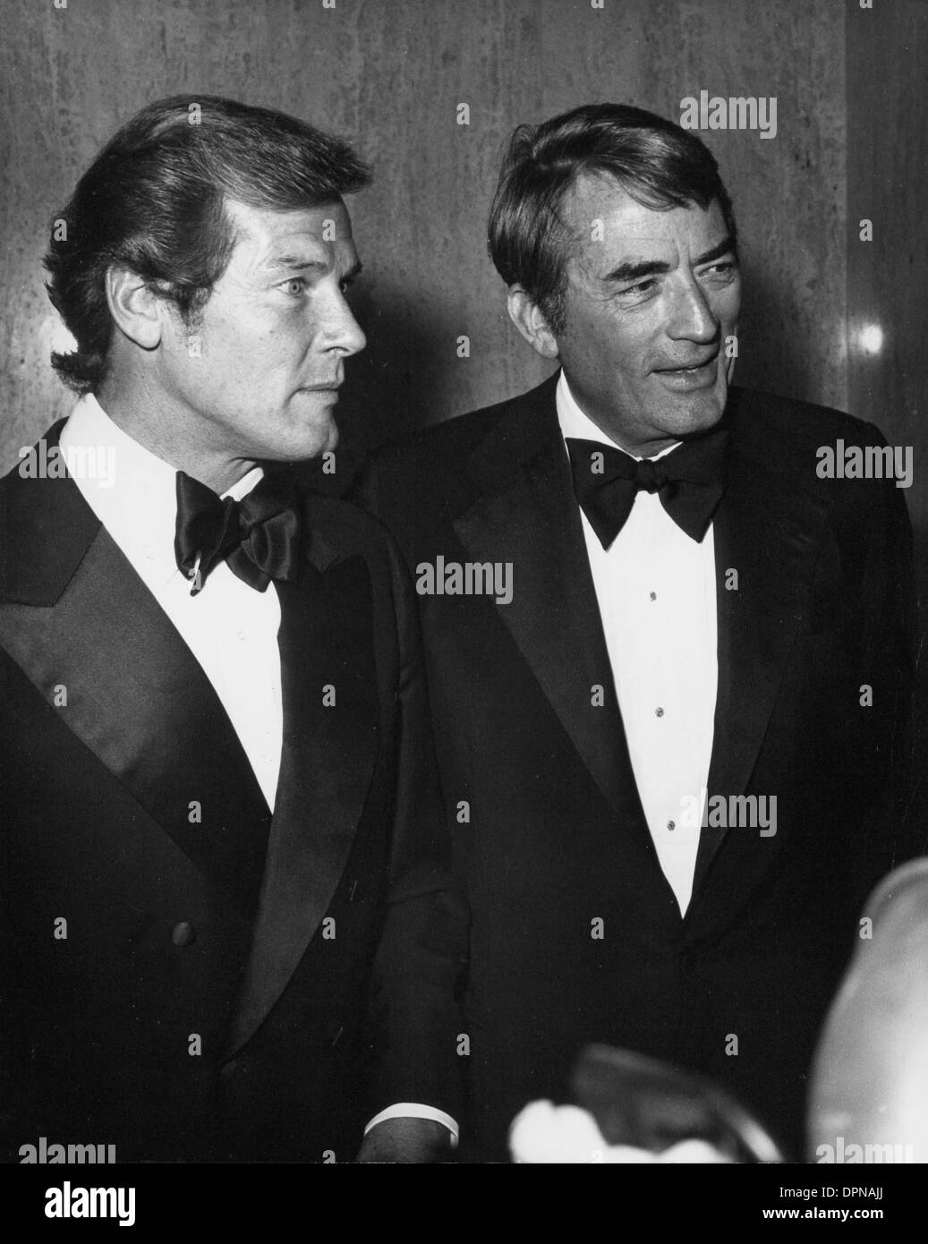 July 28, 2006 - ROGER MOORE WITH GREGORY PECK. NATE CUTLER-(Credit Image: © Globe Photos/ZUMAPRESS.com) Stock Photo