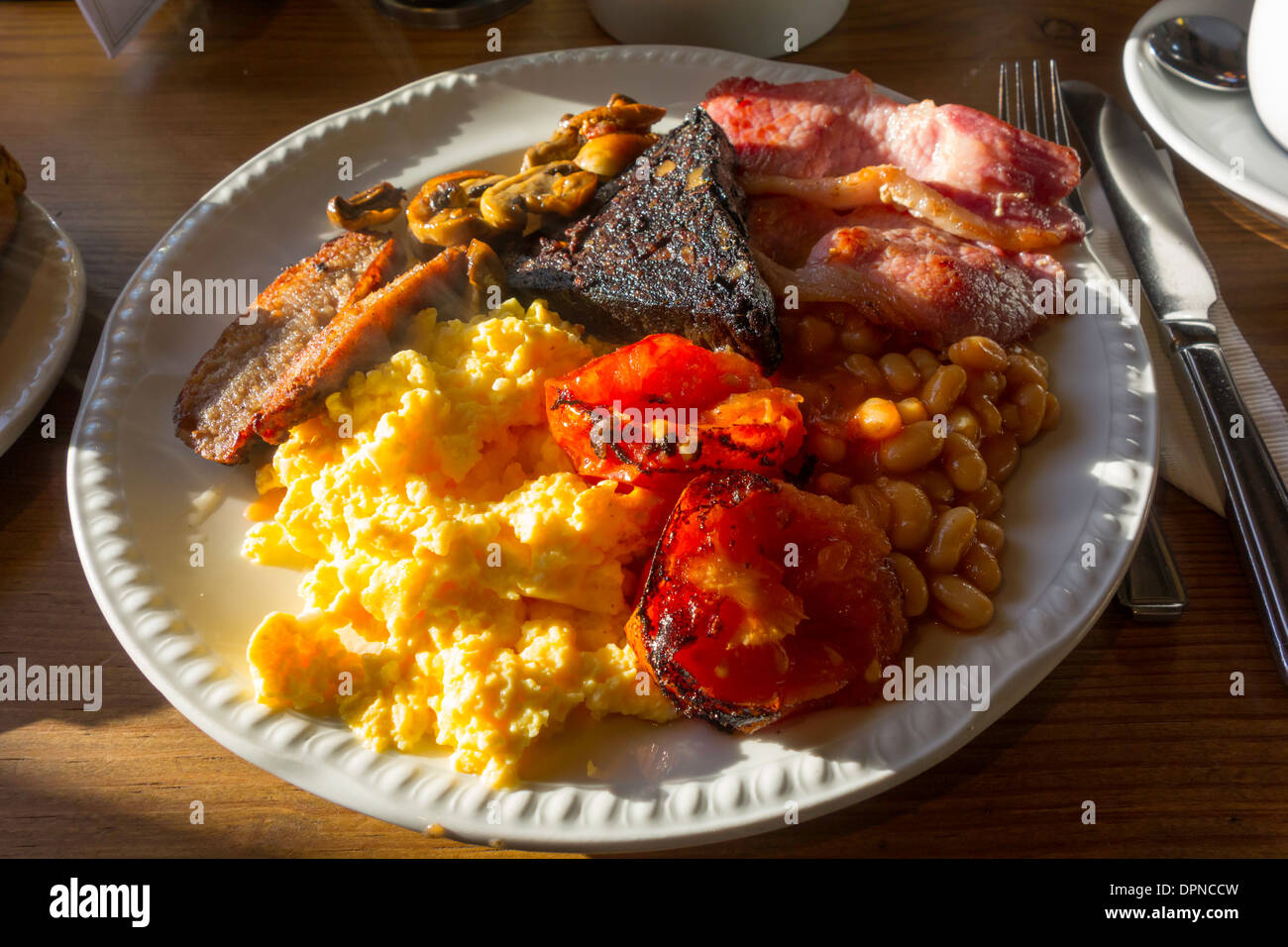 Full English Breakfast bacon scrambled egg sausage mushrooms baked