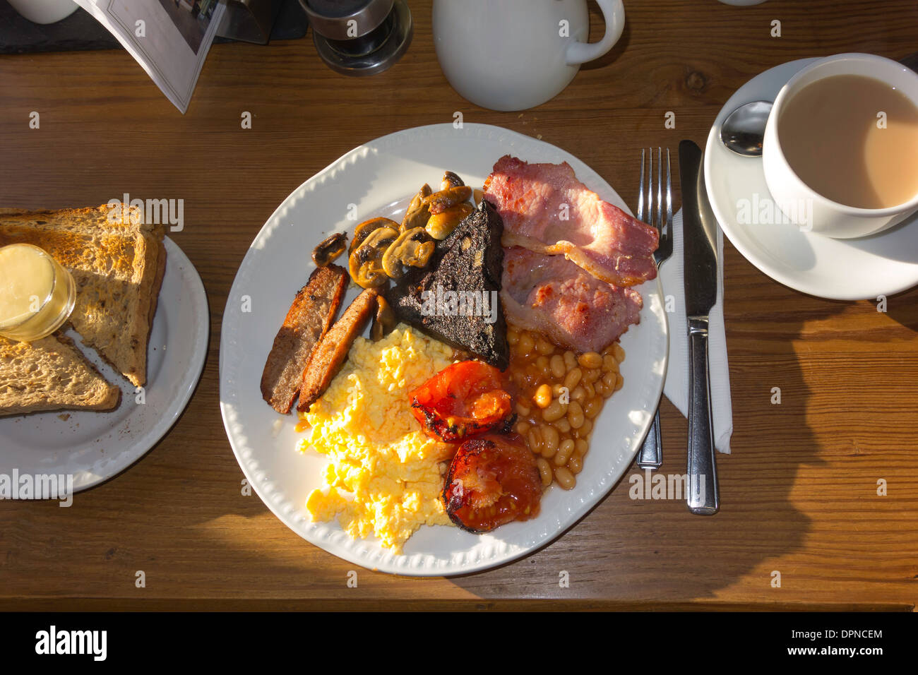 Full English Breakfast bacon scrambled egg sausage mushrooms baked